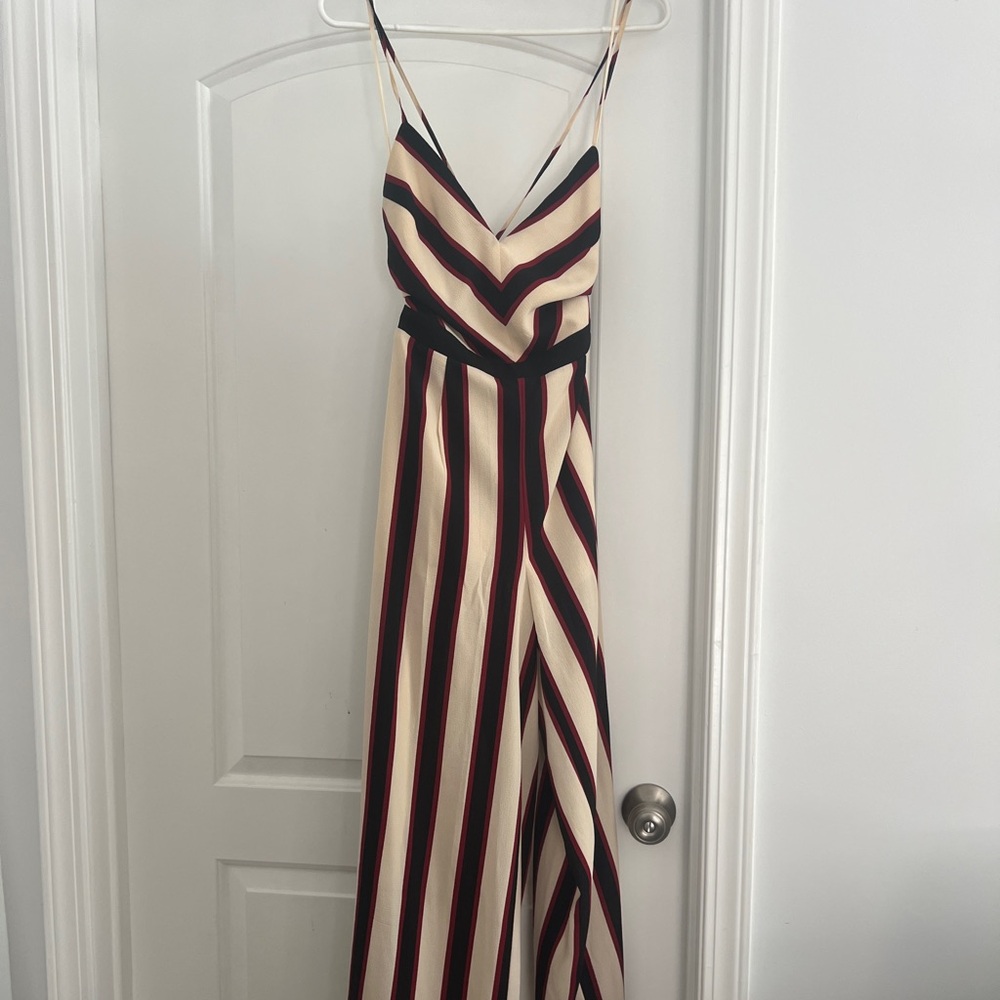 Multi-Color Jumpsuit Romper: Size Small. Perfect for summer, style with sandals